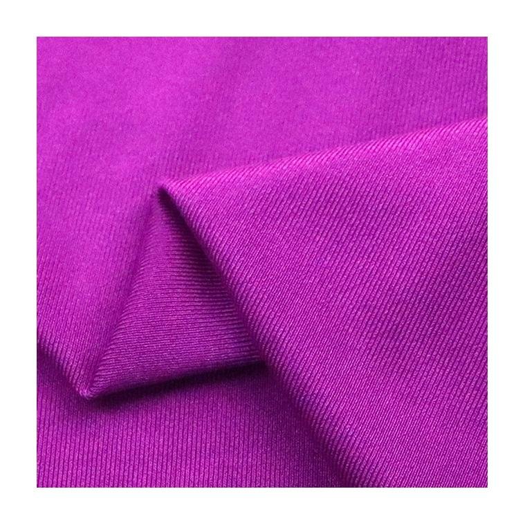 Polyester glossy four-way stretch swimsuit fabric high elastic yoga swimsuit fabric spot supply