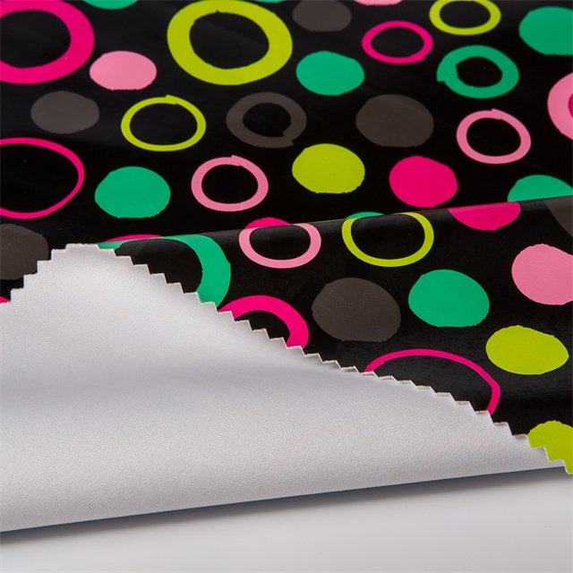 Custom printed PU Garment leather fabric for raincoat material synthetic leather 100% polyester fabric