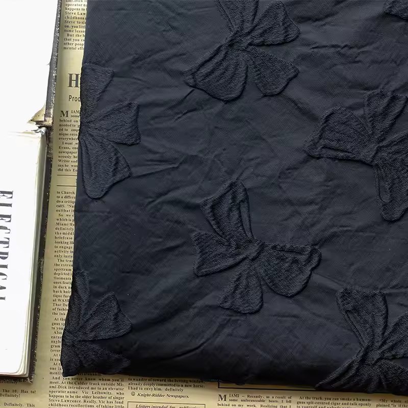 New design Hot sell embossed black 3D bowknot pattern dress gown clothing slim dress jacquard textile