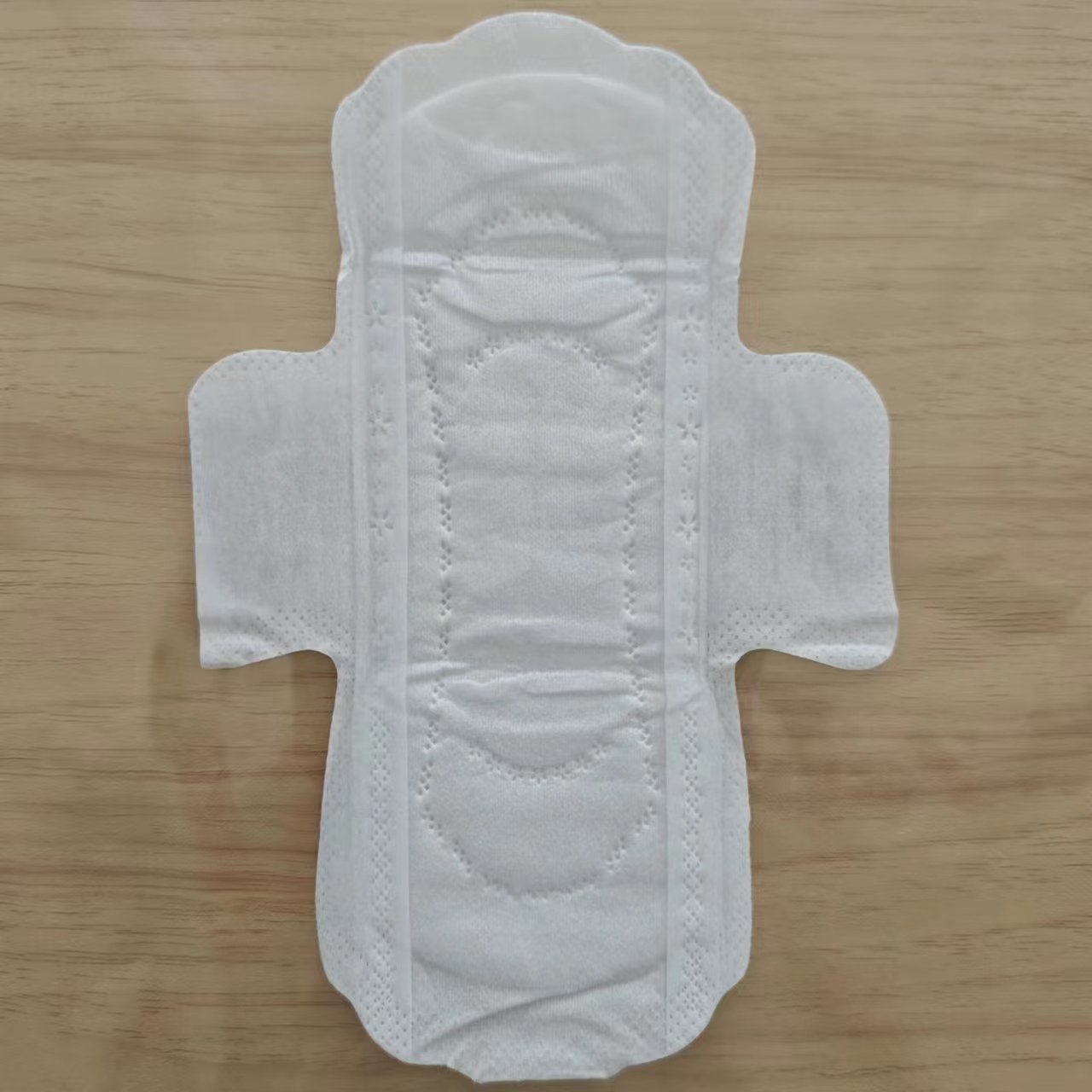 Cotton spunlace non-woven fabric 40gsm light custom sanitary napkin fabric original ecological no additives