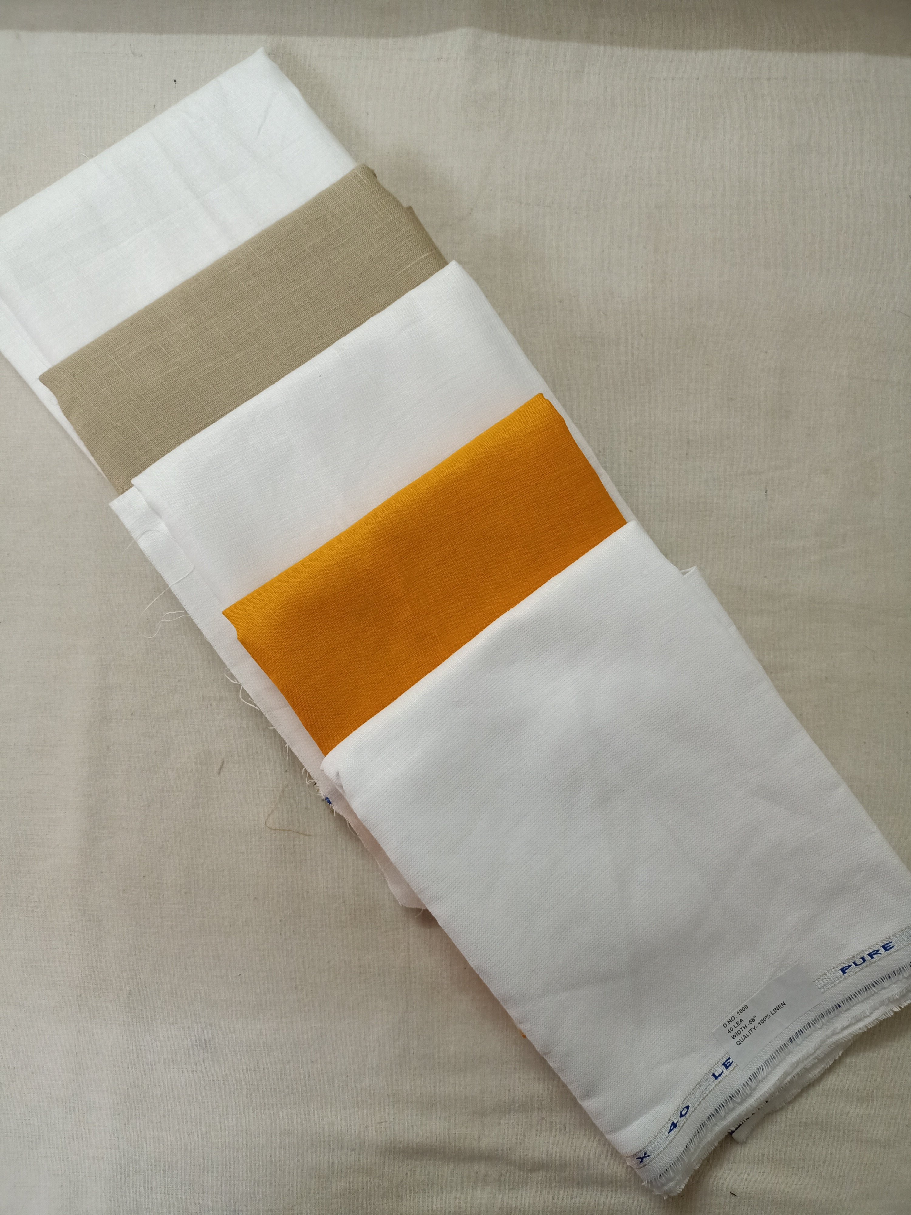 custom made 100% natural linen fabrics in natural and dyed colors ideal for clothing designers and fabric supply stores