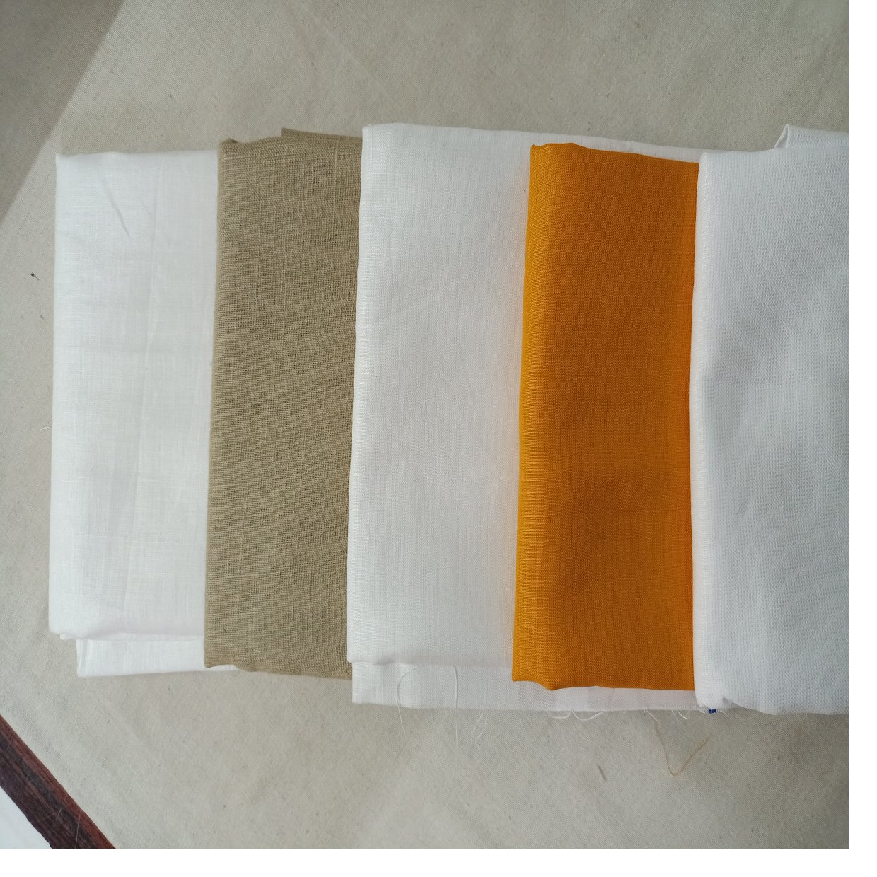 custom made 100% natural linen fabrics in natural and dyed colors ideal for clothing designers and fabric supply stores