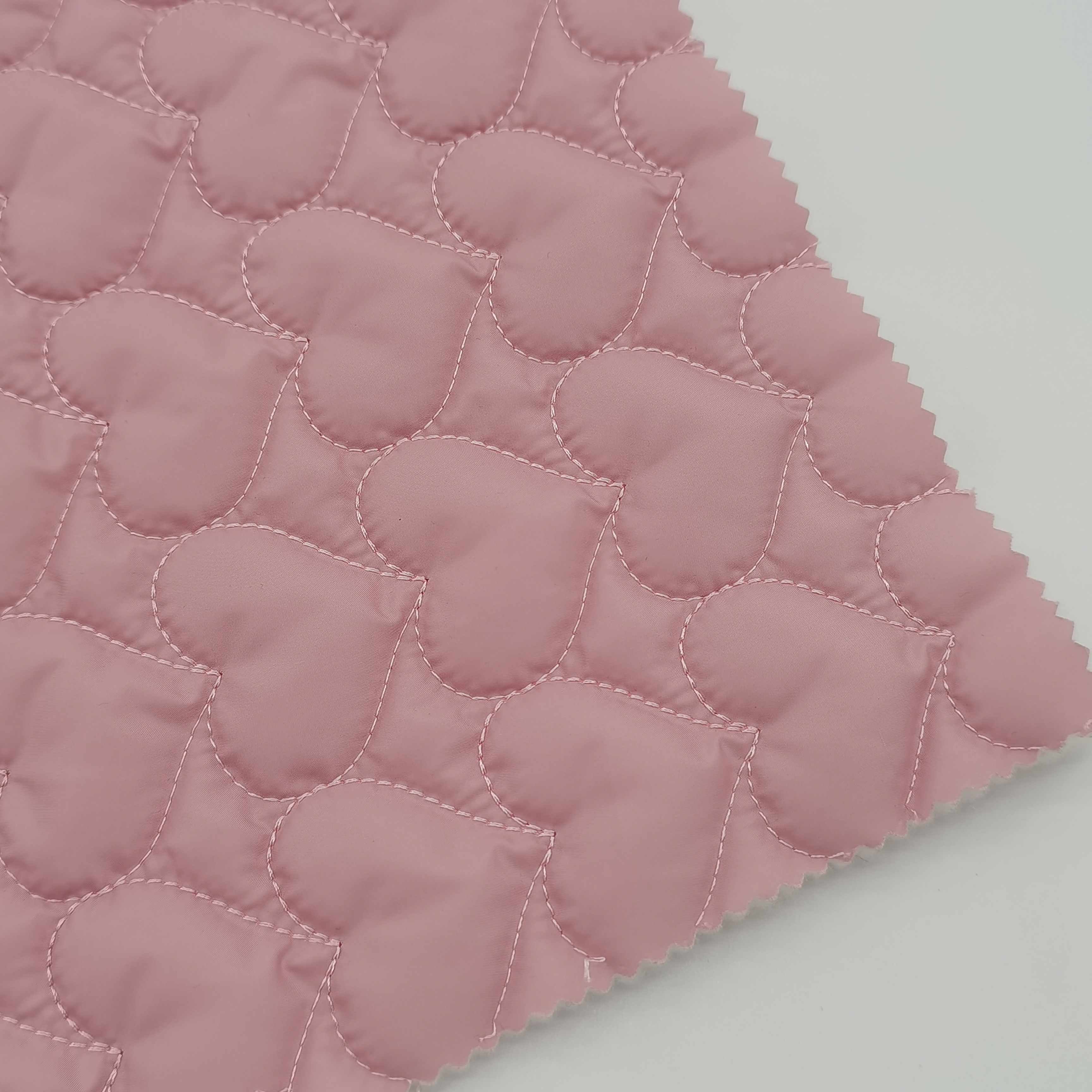 Low MOQ 300 meters 100% polyester pongee 140g padding quilted heart fabric for coat
