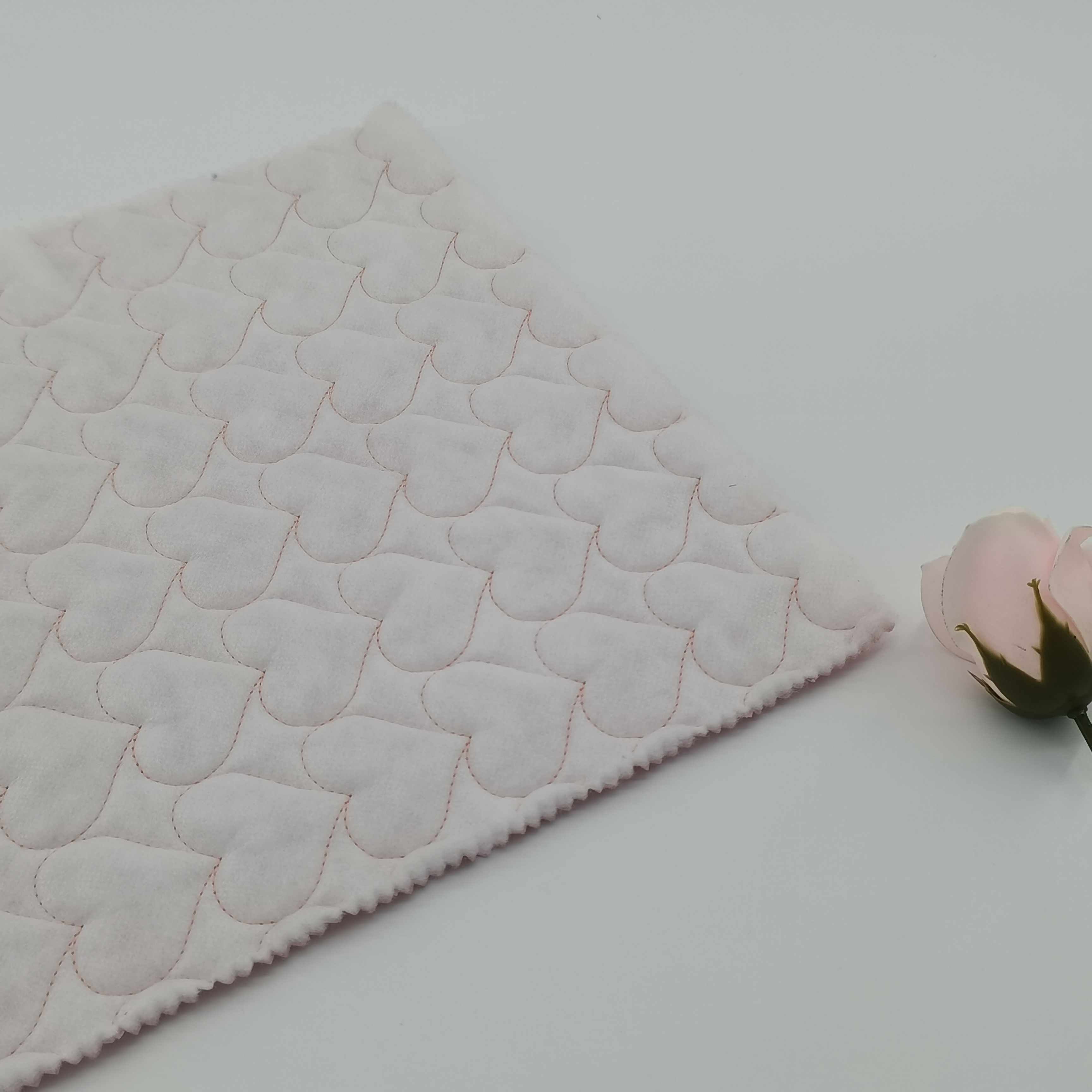 Low MOQ 300 meters 100% polyester pongee 140g padding quilted heart fabric for coat