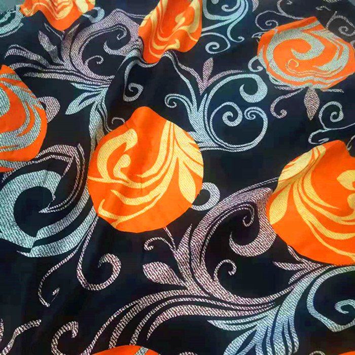 Cheap price African wax cloth design style polyester disperse printed bed linen garment fabric in the Indonesian market 85gsm