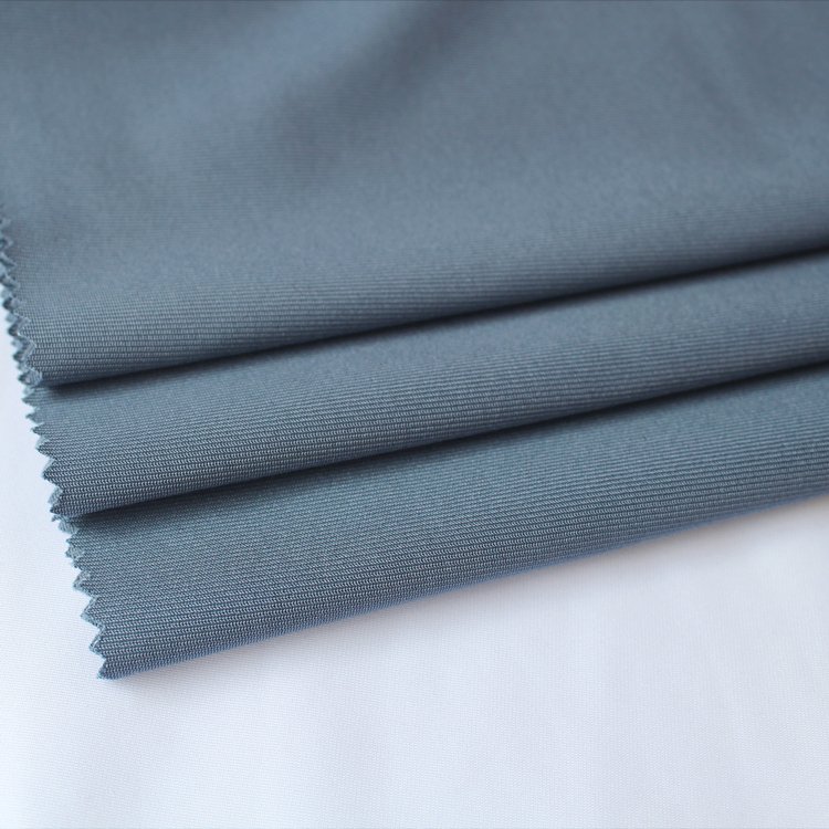 Manufacturers direct sale 75D 100% polyester warp knitting fabric for garment material