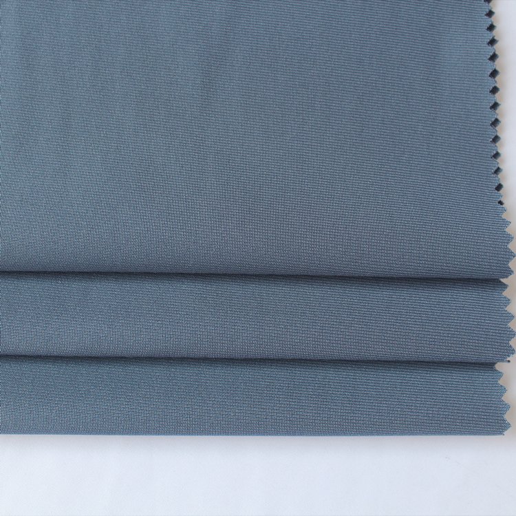 Manufacturers direct sale 75D 100% polyester warp knitting fabric for garment material
