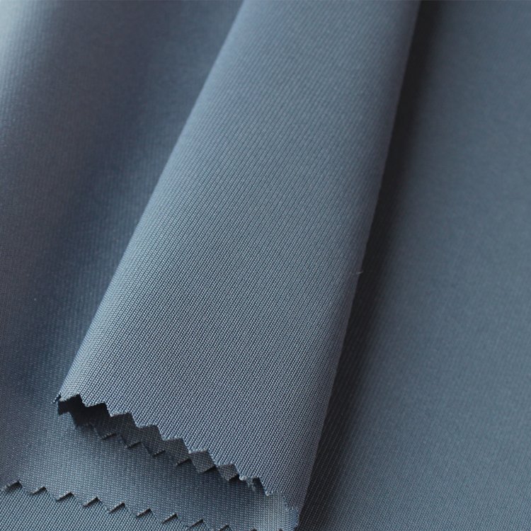 Manufacturers direct sale 75D 100% polyester warp knitting fabric for garment material