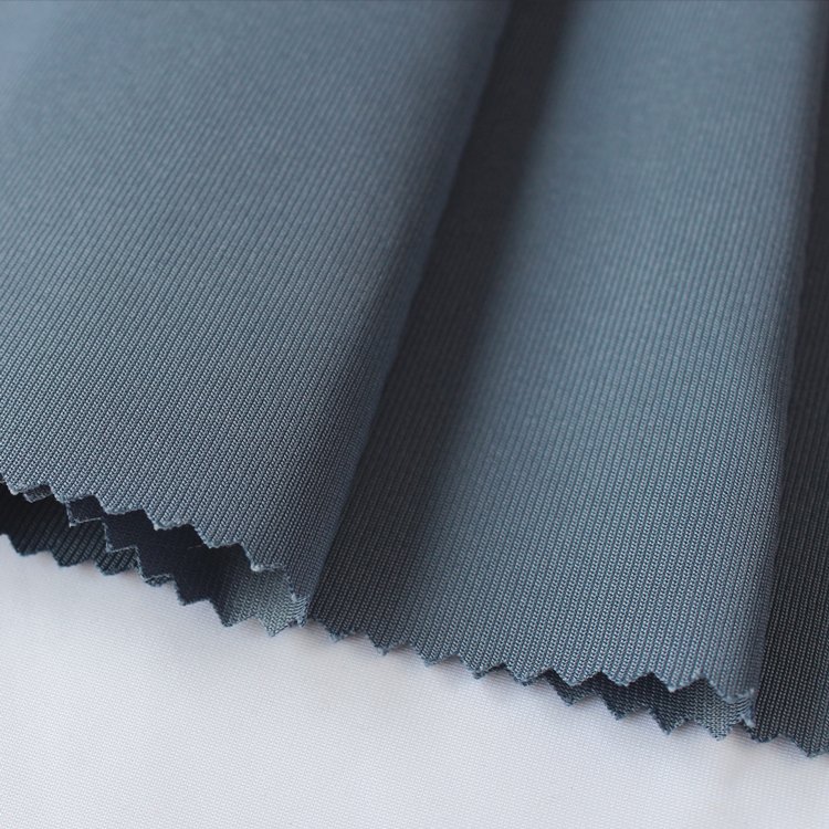 Manufacturers direct sale 75D 100% polyester warp knitting fabric for garment material