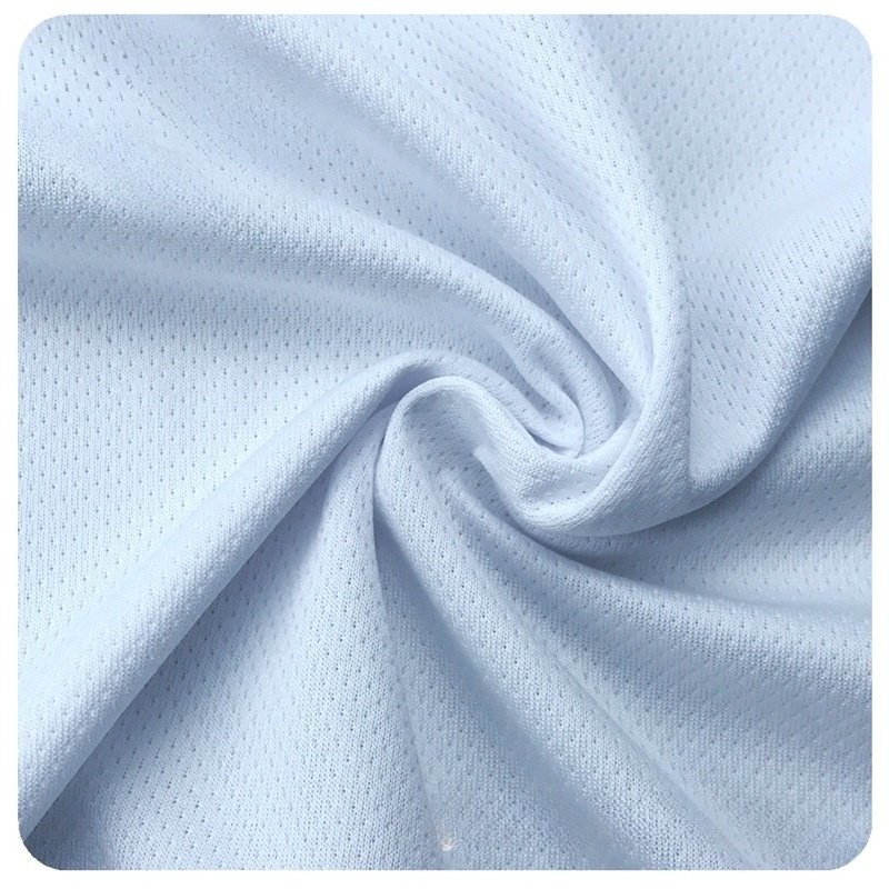 White sublimation printing sports training shirt stock cloth 100 recycled polyester eyelet knit micro mesh fabric for t shirts