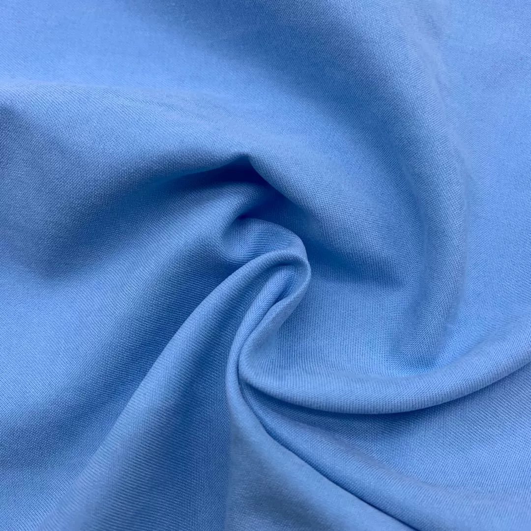 Factory stock 120gsm 100% polyester twill microfiber peach skin fabric for beach short shirt