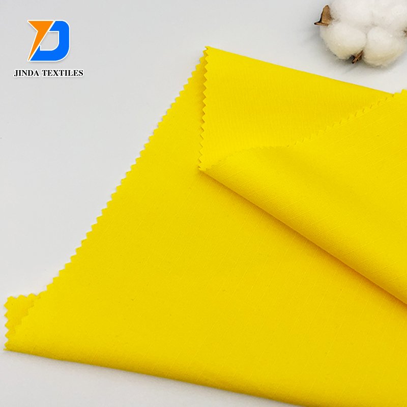 Jinda 100% polyester manufacture plain dyed flannel fleece fabric cotton flannel fabric