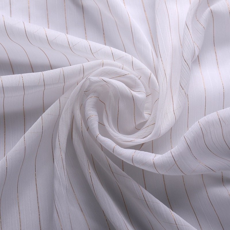 China Manufacturers Wrinkle Light And Smooth 75D*75D Gold Silk Chiffon Fabric For Dress Casual Wear Women's Clothing Fabric