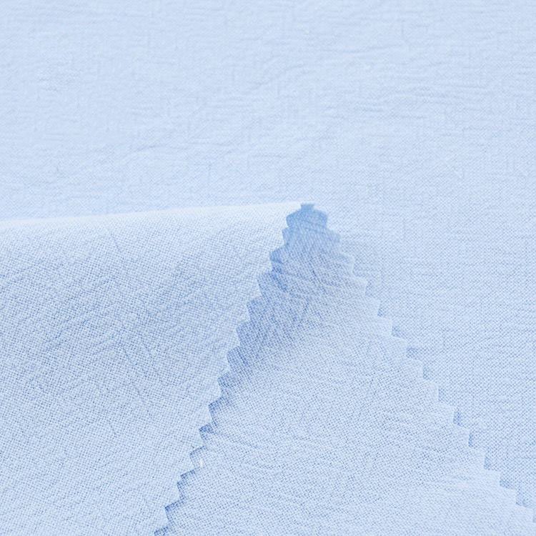 Wholesale blue 100% linen fabric breathable woven 190gsm washed linen fabric roll for clothes