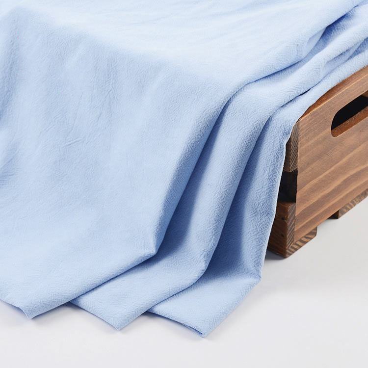 Wholesale blue 100% linen fabric breathable woven 190gsm washed linen fabric roll for clothes