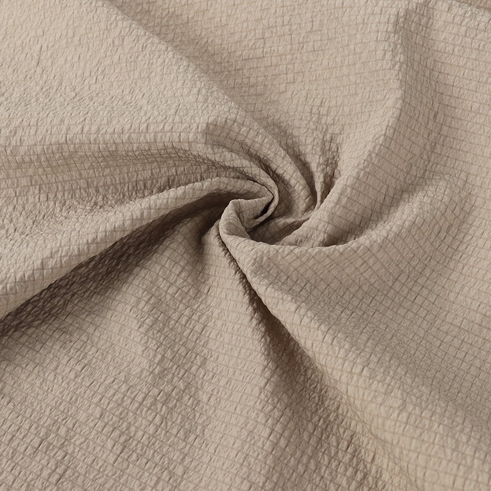 Recyclable 100% Polyester T400 Bubble Jacquard Plain Windproof Waterproof Woven Fabric Mechanical Elasticity Factory