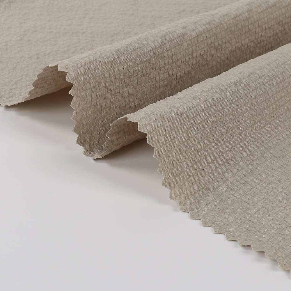 Recyclable 100% Polyester T400 Bubble Jacquard Plain Windproof Waterproof Woven Fabric Mechanical Elasticity Factory