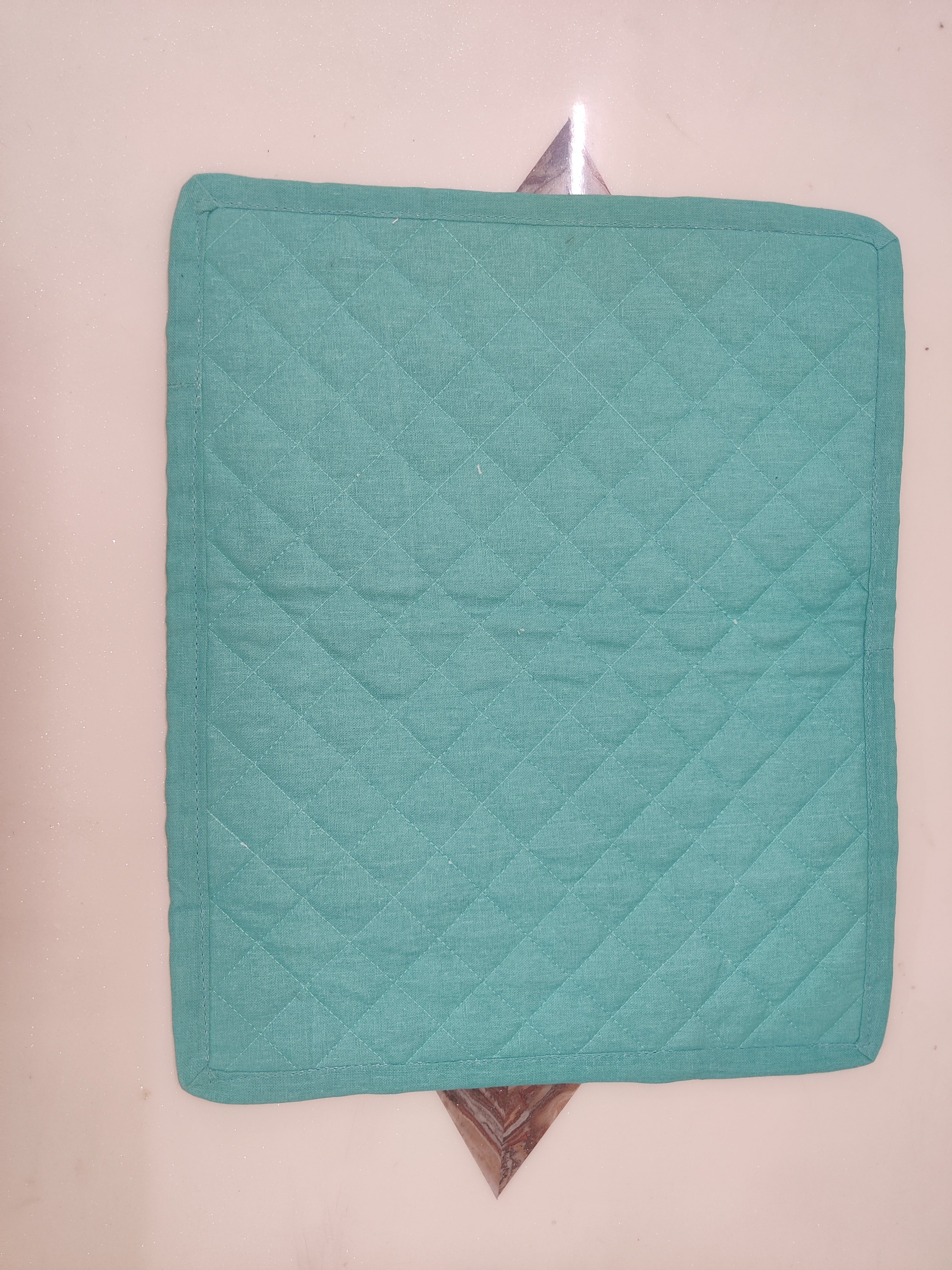100% cotton placemats two sides one side plain other side printed light quilted can be customized designs styles made in India.