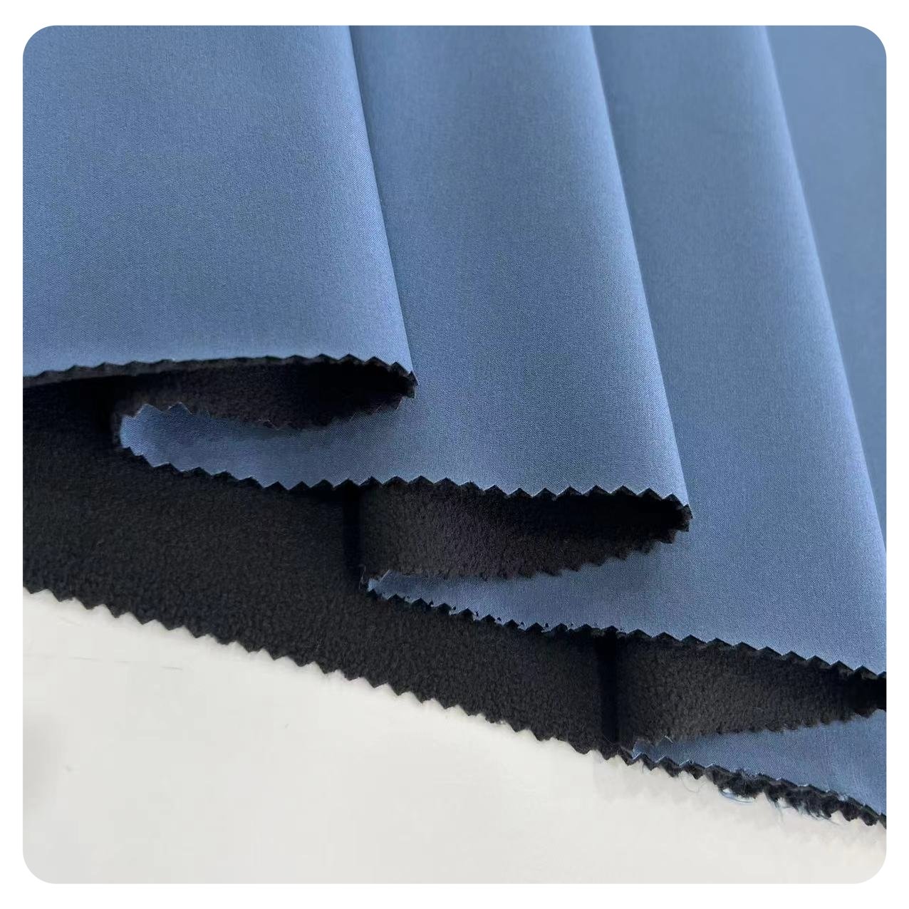 100% polyester Weight 200-400gsm 2 layer poly pongee and Polar fleece Soft Shell Fabric for jacket