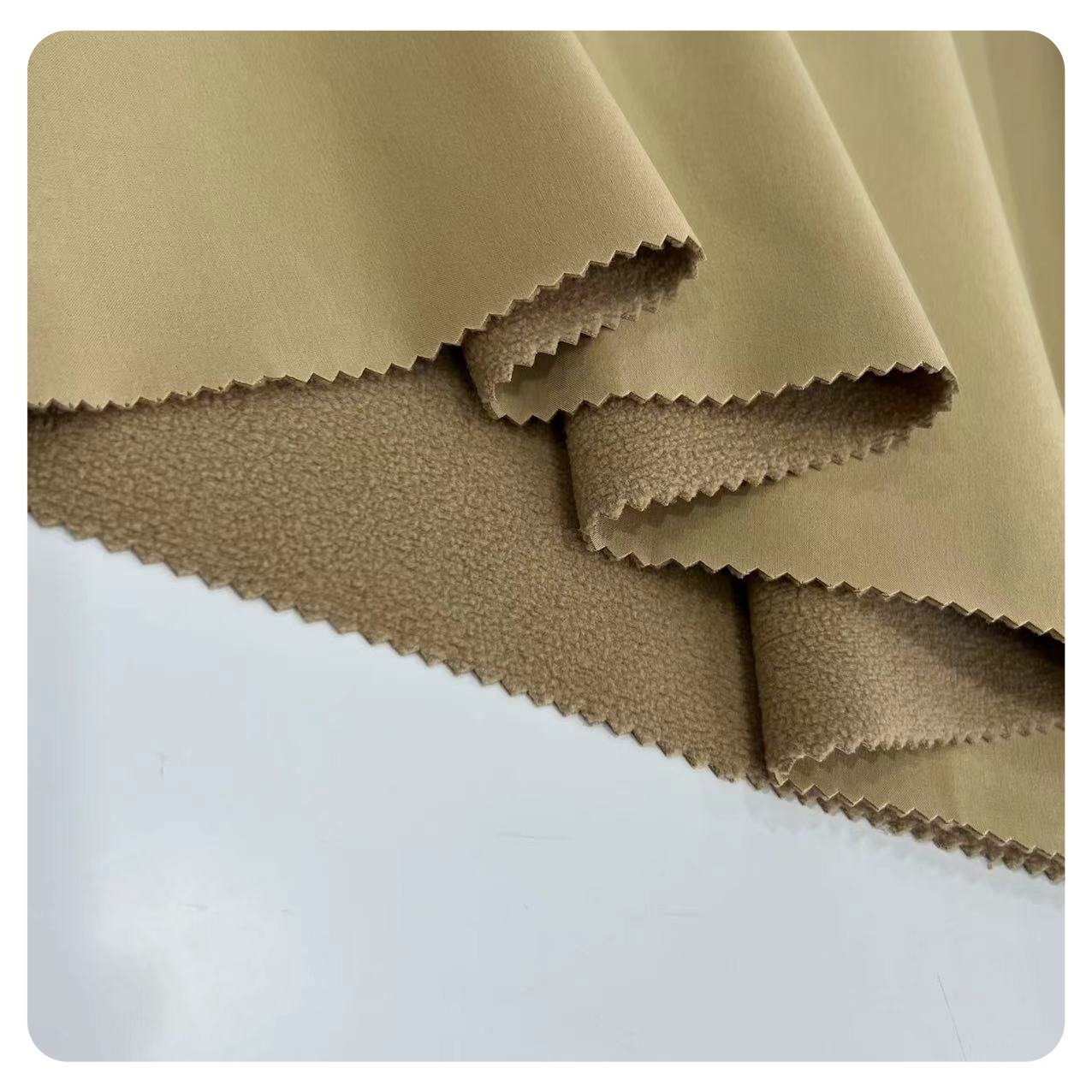 100% polyester Weight 200-400gsm 2 layer poly pongee and Polar fleece Soft Shell Fabric for jacket