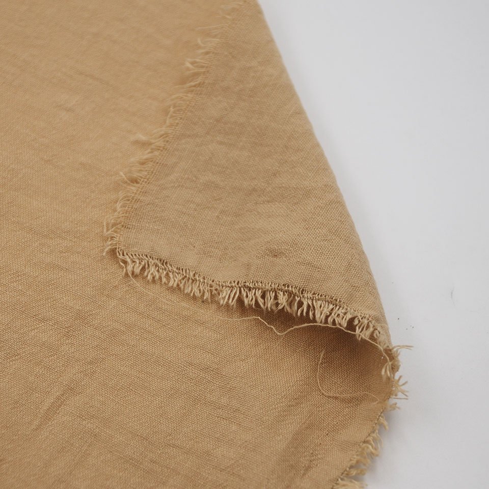 Low wholesale price soft solid slub pure color 100% polyester stone washed fake linen fabric