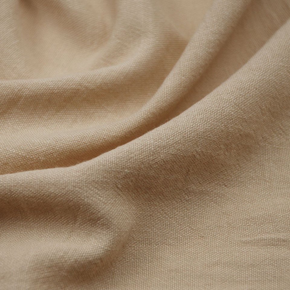 Low wholesale price soft solid slub pure color 100% polyester stone washed fake linen fabric