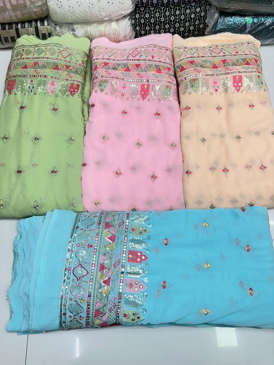 Modern New Design Faux Georgette Embroidery Fabric Woven Pattern Sequence for Bridal Dresses Available at Wholesale Price