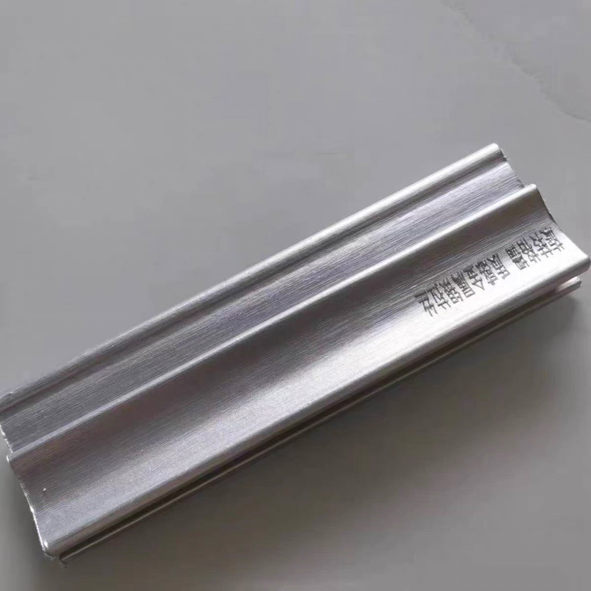 Modern WPC Wall Panel with High Gloss Metal Apple Silver Finish Fire-Insulated Soundproof Featuring Rotating Grille Wrap Columns