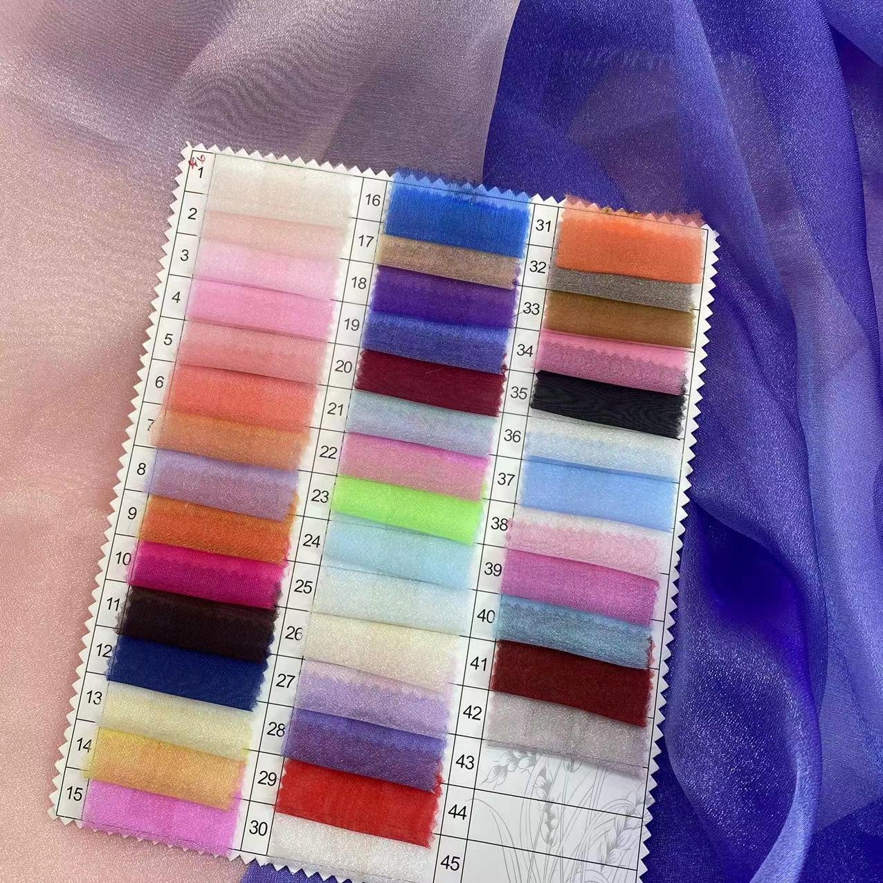Factory direct sale reasonable price beautiful shiny cloud gauze lightweight organza fabric for wedding dress