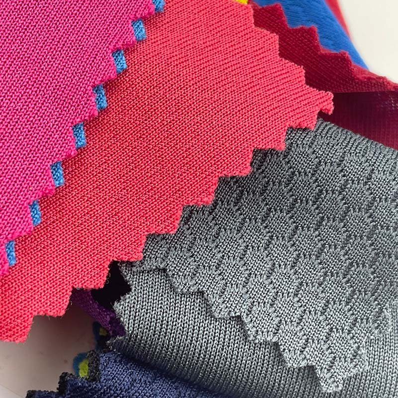 Hot sales moisture absorbing 75D honeycomb texture 100 polyester 150g basketball mesh single jersey fabric