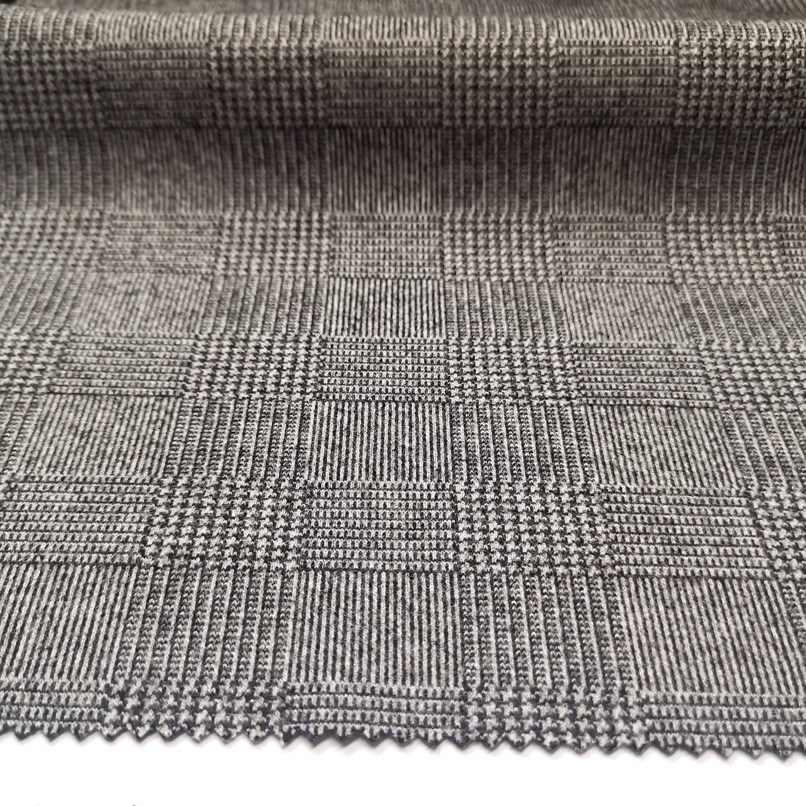 100%Polyester lint brush knit jacquard fabric yarn dye prickle finishing knit fabric for garment coat jacket