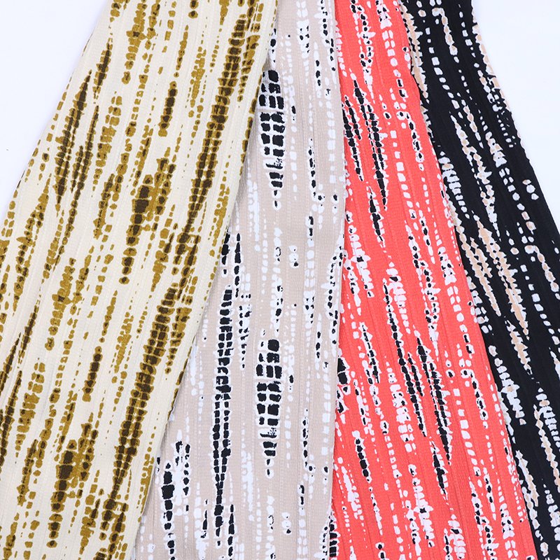 Yiwu manufacturers direct spot impenetrable chiffon new leopard print clothing fabrics 100% polyester printed fabrics