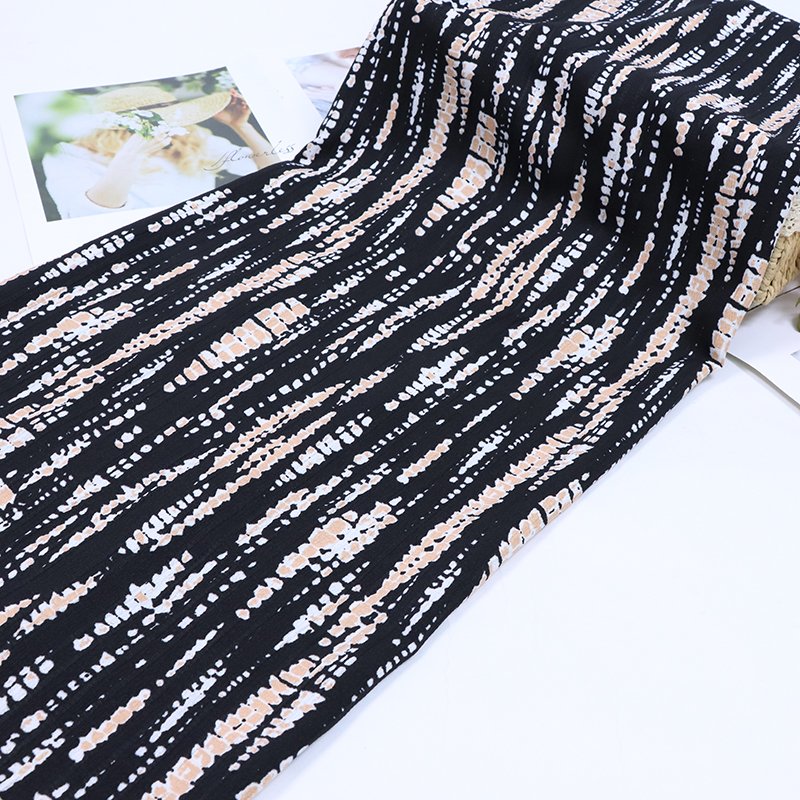 Yiwu manufacturers direct spot impenetrable chiffon new leopard print clothing fabrics 100% polyester printed fabrics