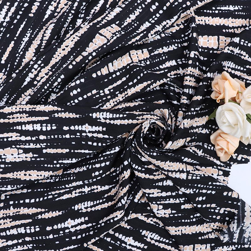 Yiwu manufacturers direct spot impenetrable chiffon new leopard print clothing fabrics 100% polyester printed fabrics