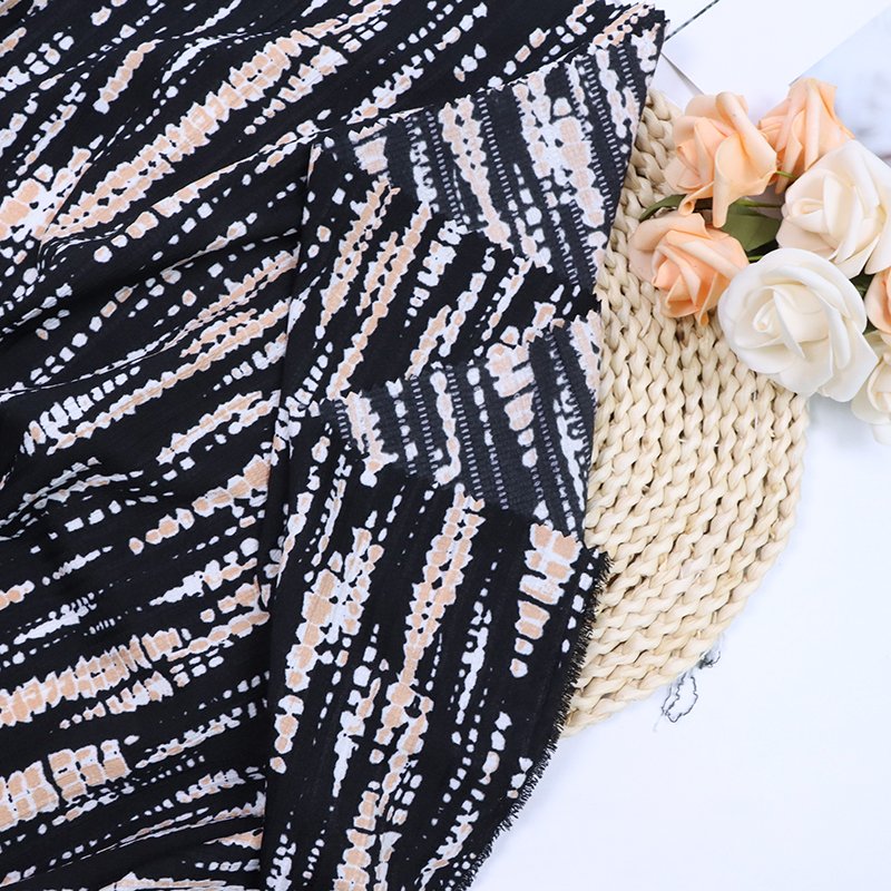 Yiwu manufacturers direct spot impenetrable chiffon new leopard print clothing fabrics 100% polyester printed fabrics