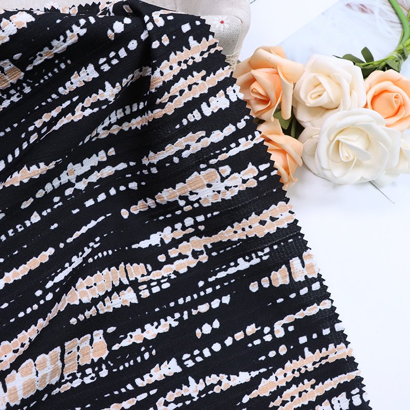 Yiwu manufacturers direct spot impenetrable chiffon new leopard print clothing fabrics 100% polyester printed fabrics
