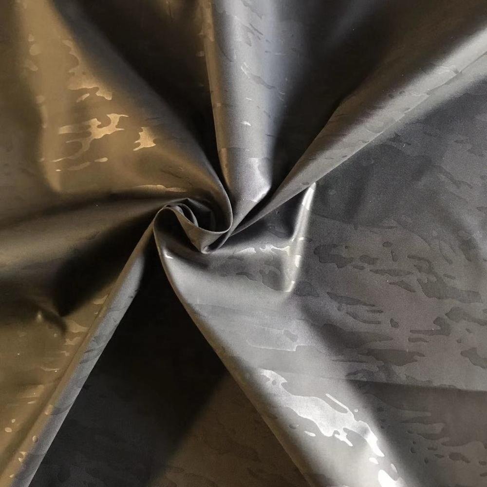 Good Quality 100% Polyester 75D Embossed Imitated Memory Fabric PU Coating Waterproof Fabric for Garment