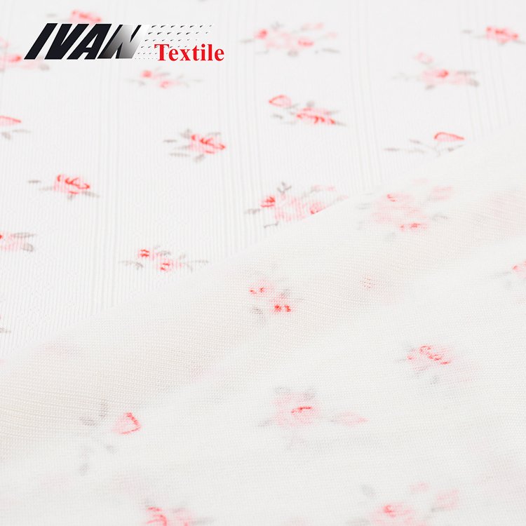 Wholesale cheap women garment knitted DTY polyester spandex printed jacquard jersey fabric
