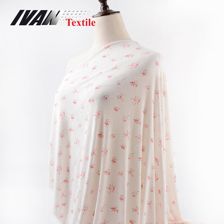 Wholesale cheap women garment knitted DTY polyester spandex printed jacquard jersey fabric