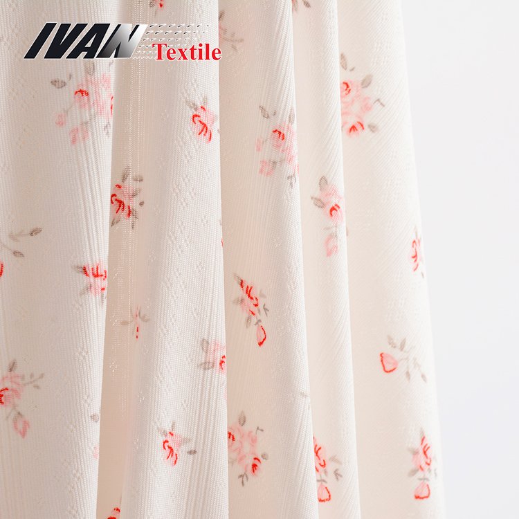 Wholesale cheap women garment knitted DTY polyester spandex printed jacquard jersey fabric