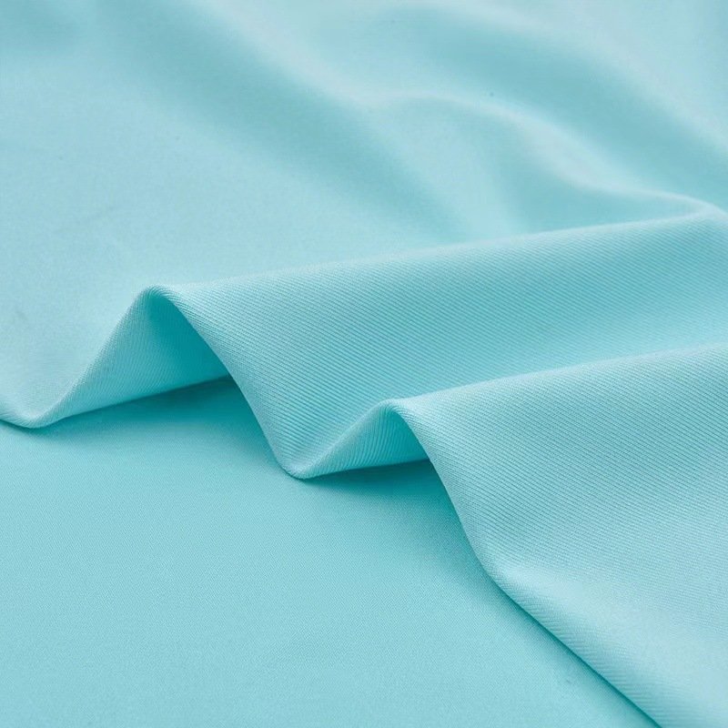 High quality 100D DTY 180gsm polyester spandex knitted solid single jersey fabric without brush for tshirts