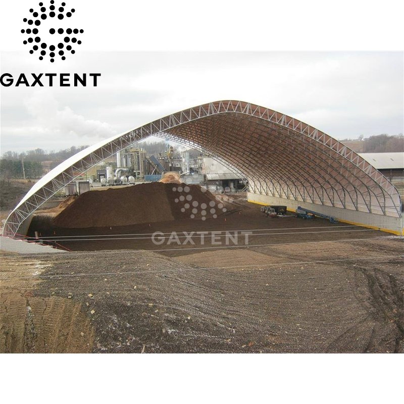 Metal Frame Tent With Durable Pvc Fabric Designed For High Wind And Snow Load Capacities In Industrial Settings.