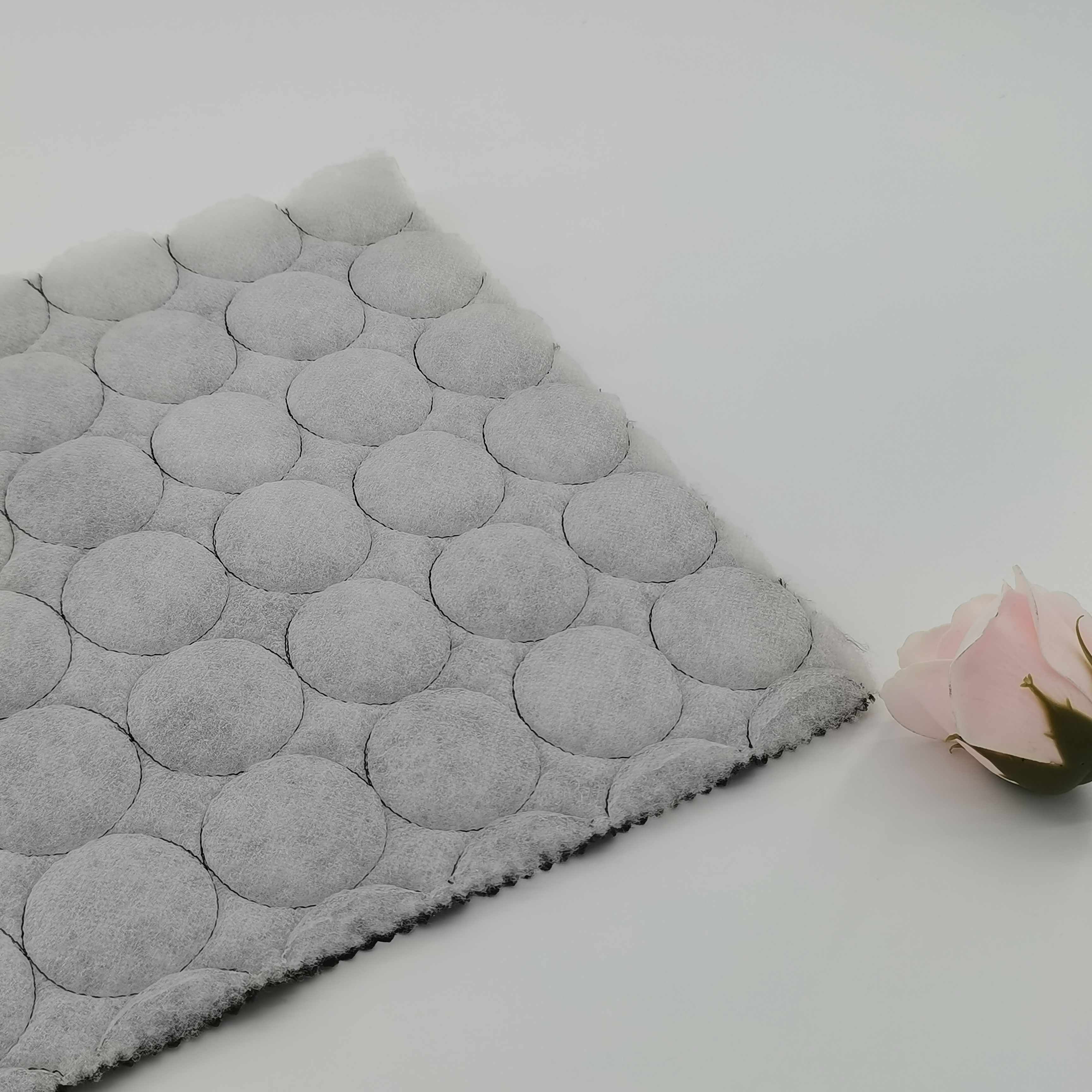 Competitive price green color cirde design ultrasonic quilted nylon fabric for light coat
