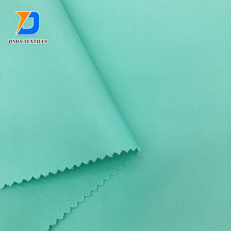 Jinda Wholesale Manufacture Factory Directly 150D*300D Yarn Counts Woven Tela Uniform Textile 175gsm 100% Polyester Twill Fabric