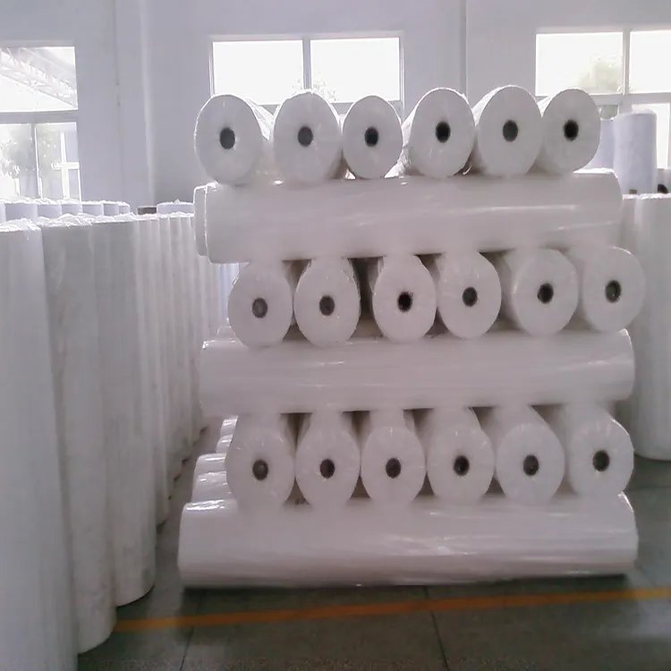 Spunbonded Polypropylene Nonwoven Fabric Paper 100% Virgin Pp Rolls Nonwoven Fabric Roll for Wrapping Flower DOT Customized Dyed