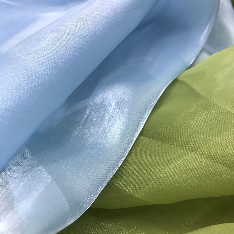 Wholesale stage costume glitter tulle fabric roll free sample home deco fabric 100% polyester fabric shiny organza for dress