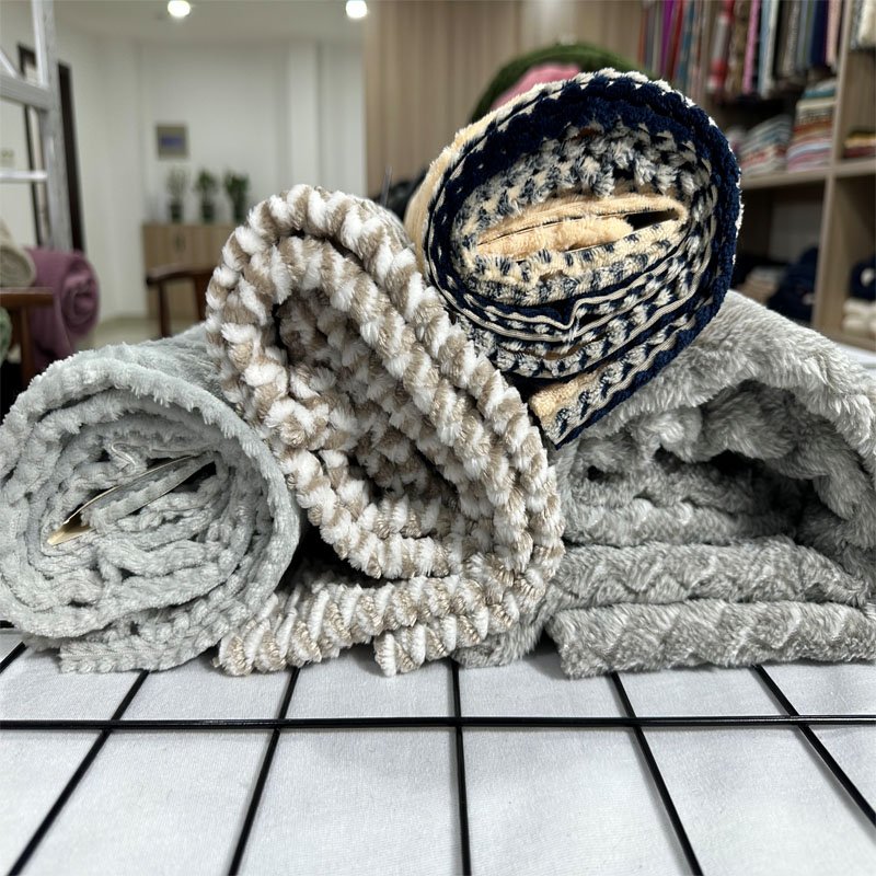 Custom OEM New Design Soft Cationic Jacquard Flannel Fabric For Pajamas Bathrobe Floor Mat Coat Blanket