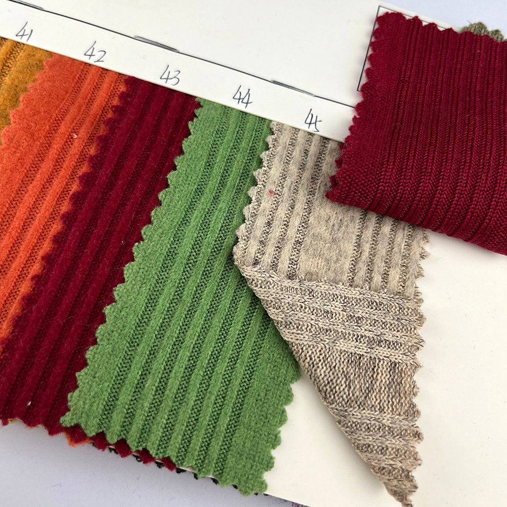 Factory stock 96.4 polyester 3.6 spandex fleece clothing fabric wholesale cable knitted sweater jacquard cardigan fabric