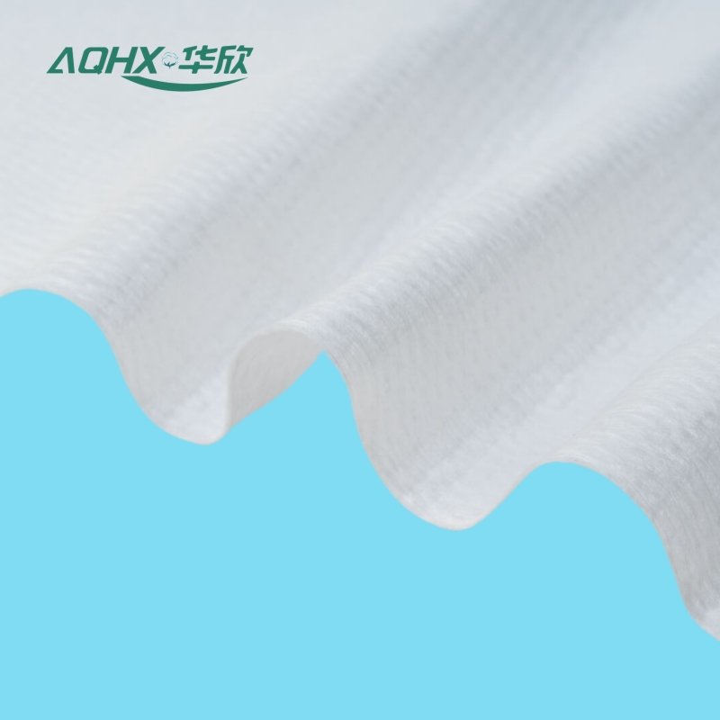 Beautiful texture of pearl pattern 30-220g 100% cotton spunlace non-woven fabric, patterns can be customized