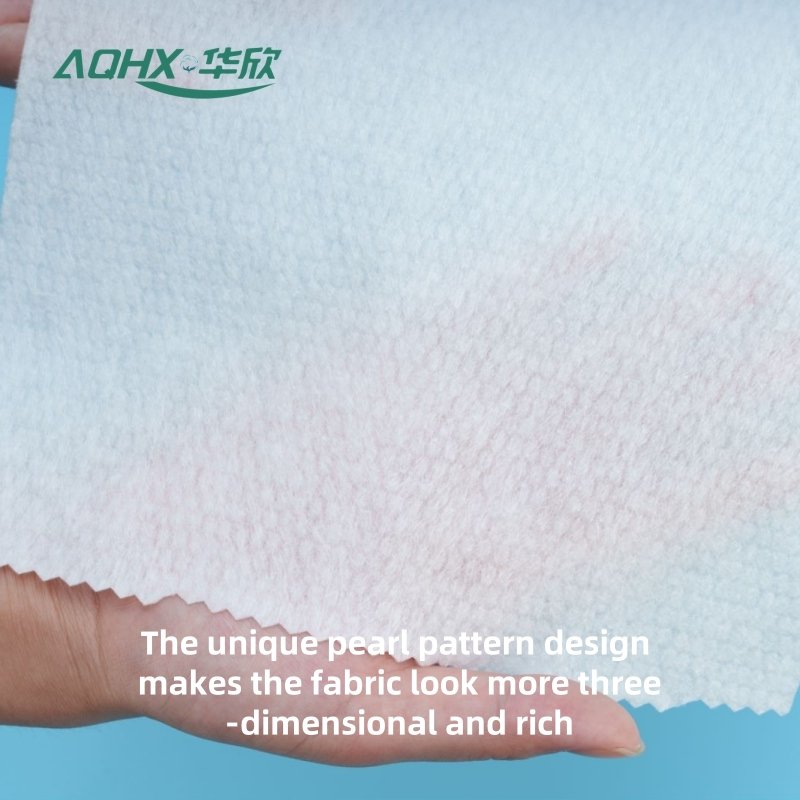 Beautiful texture of pearl pattern 30-220g 100% cotton spunlace non-woven fabric, patterns can be customized